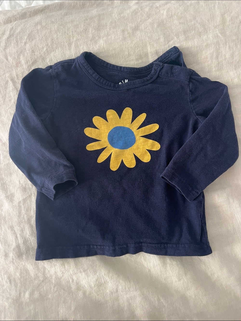 Primary Navy Long-Sleeve Tee with Yellow Flower and Blue Center